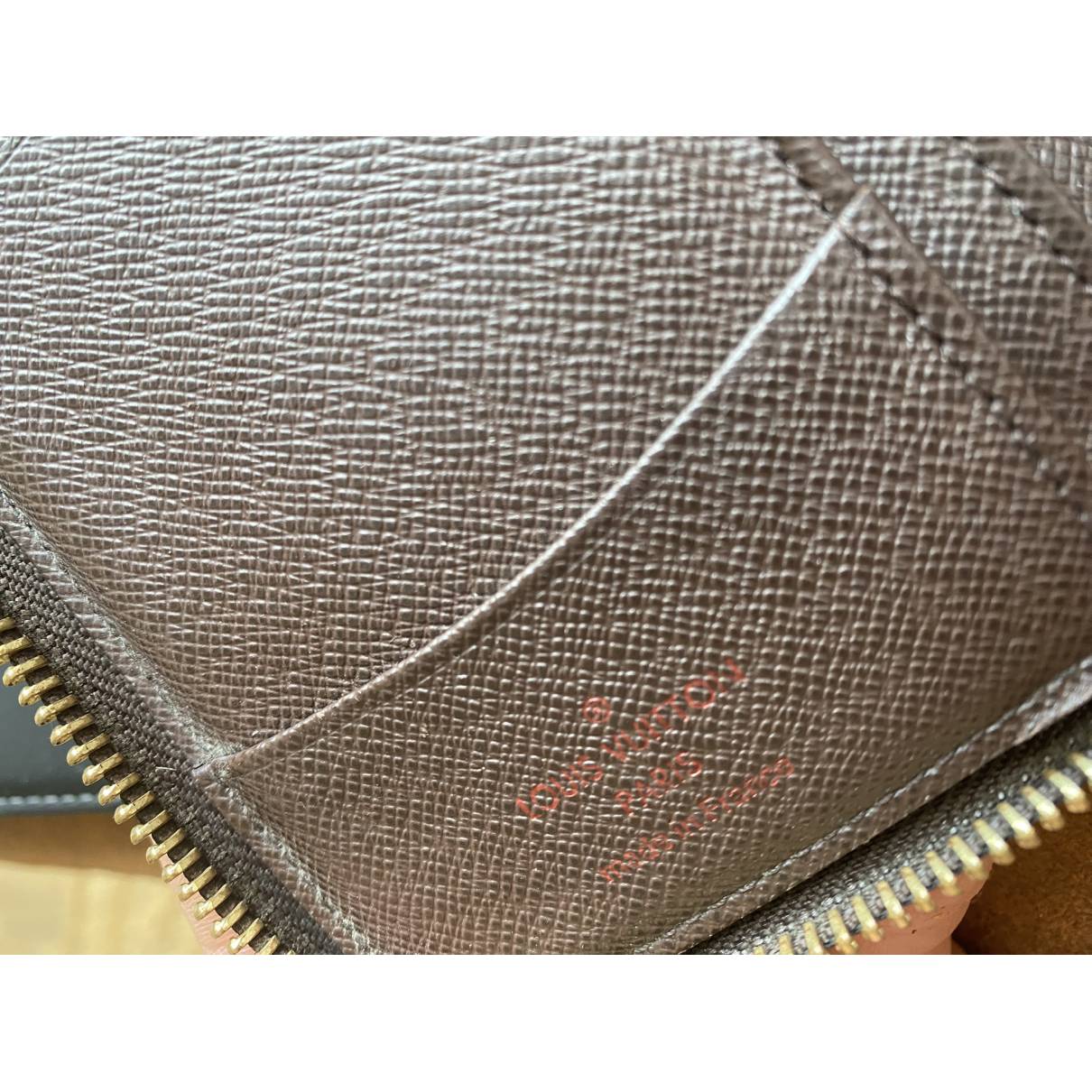 Zippy cloth wallet Louis Vuitton Brown in Cloth - 35162524