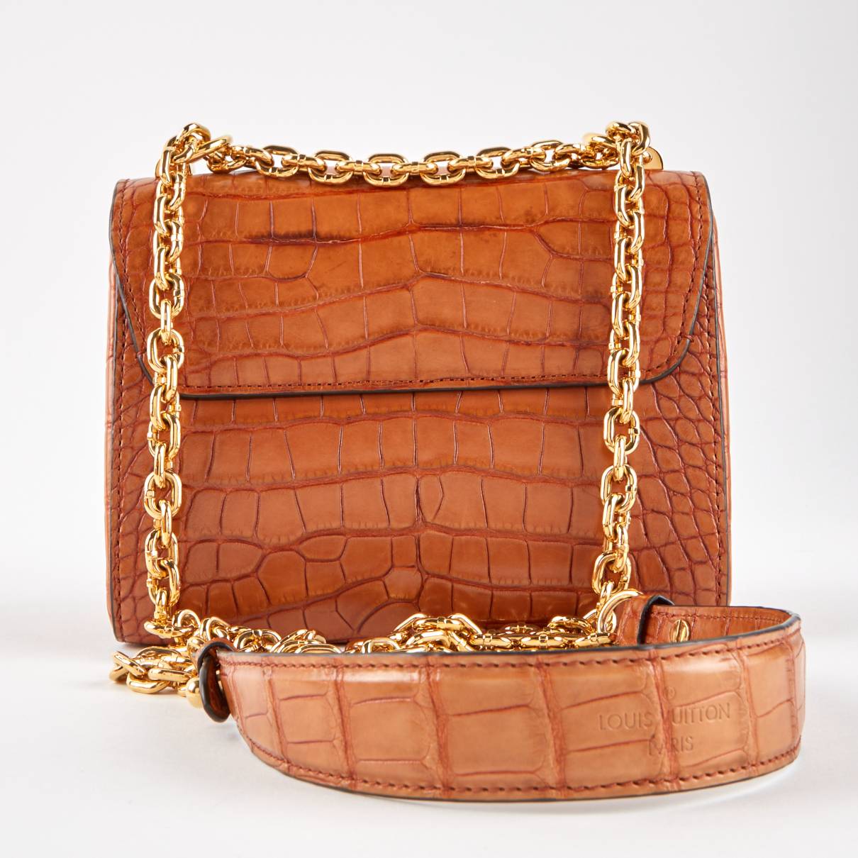 Twist exotic leathers crossbody bag Louis Vuitton Brown in Exotic