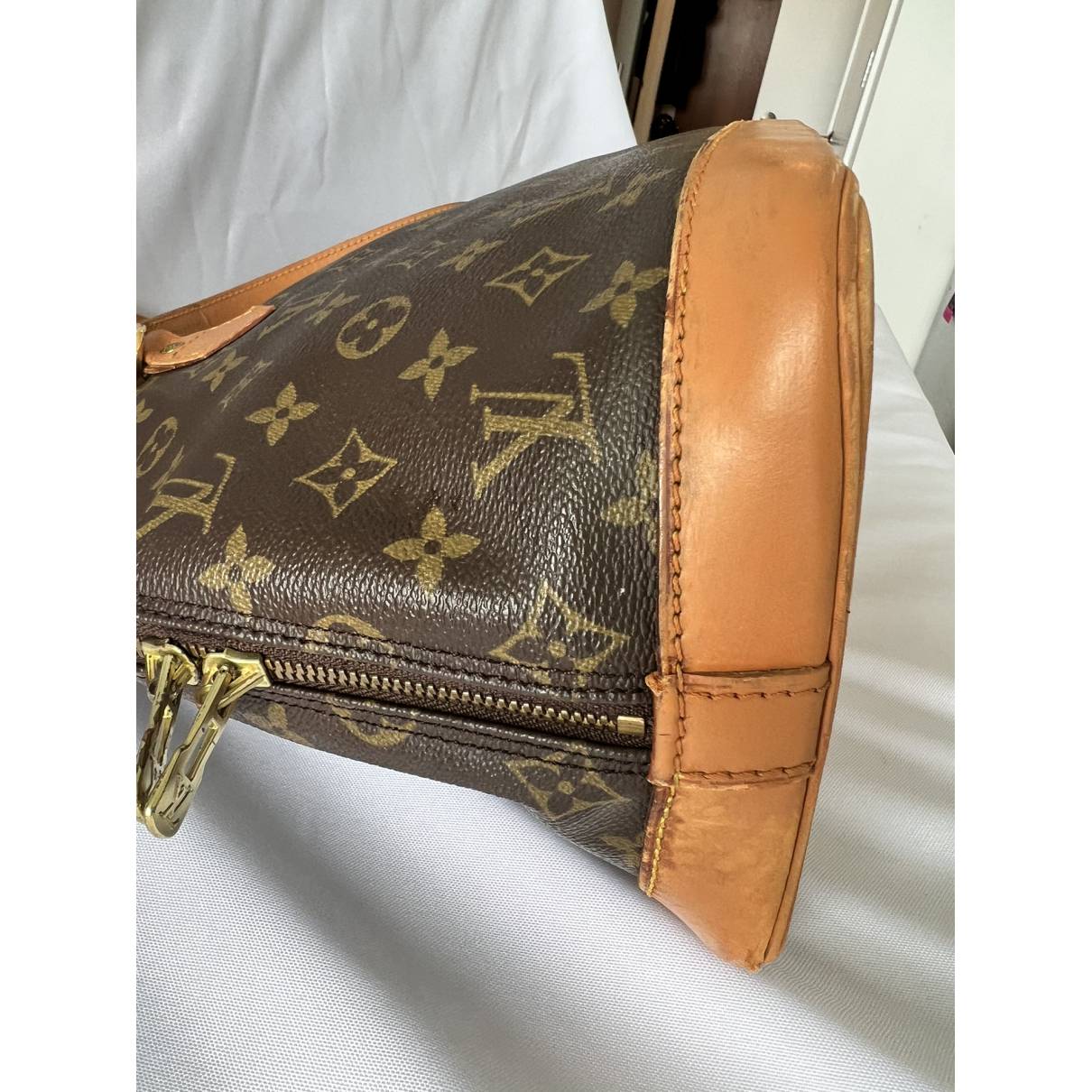 Alma leather handbag Louis Vuitton Brown in Leather - 31725299