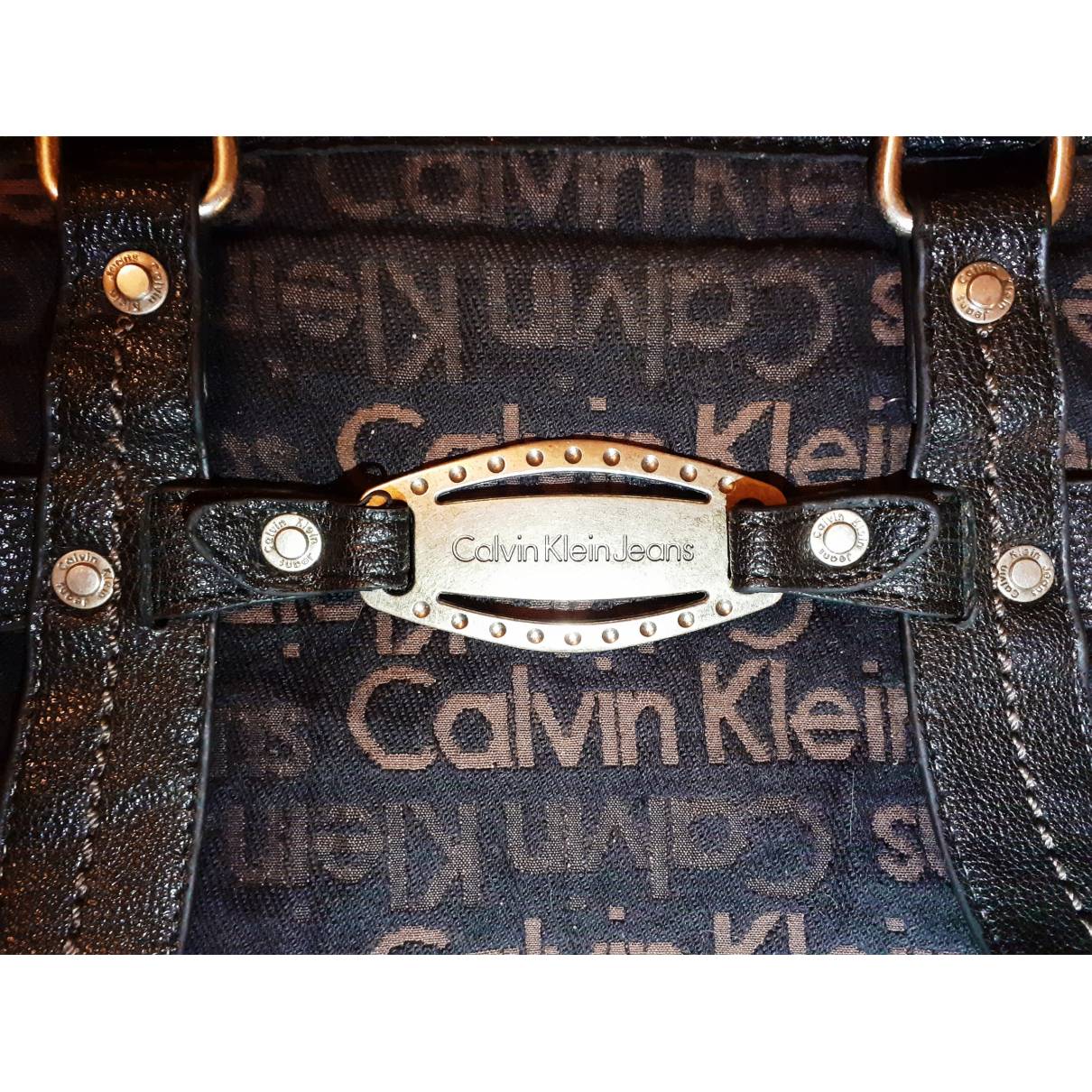 Brown Leather Calvin Klein handbag  Calvin klein handbags, Handbag, Calvin  klein bag