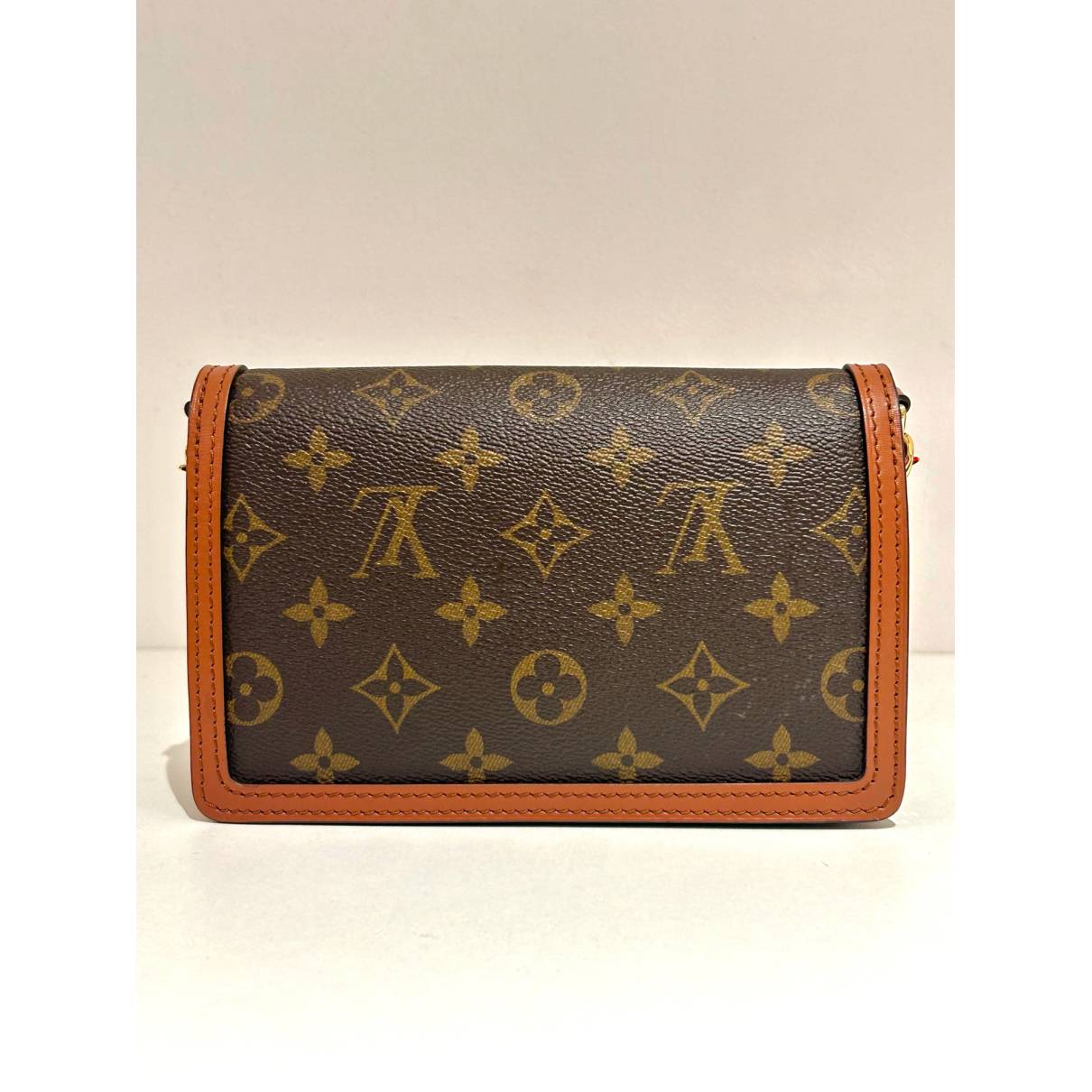 Dauphine chain wallet leather handbag Louis Vuitton Brown in