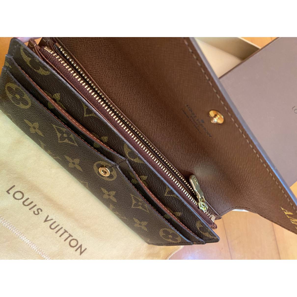 Products by Louis Vuitton: Emilie Wallet  Louis vuitton sarah wallet, Louis  vuitton emilie wallet, Emilie wallet