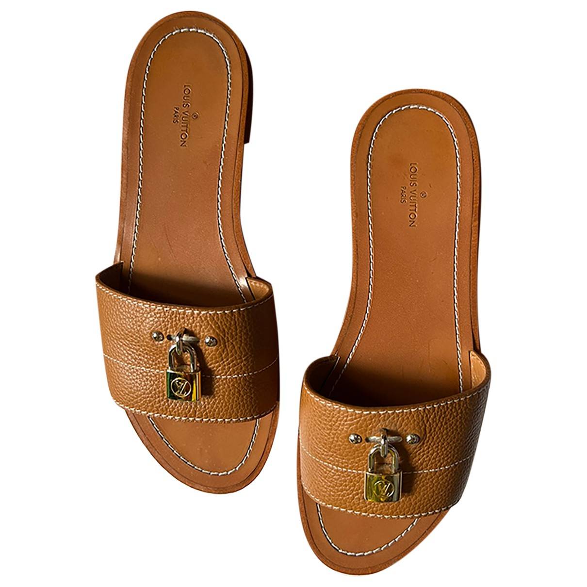 Louis Vuitton Brown Leather Lock It Flat Mules Size 37
