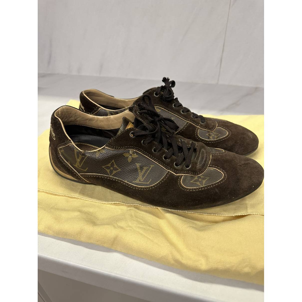 Leather low trainers Louis Vuitton Brown size 7.5 UK in Leather