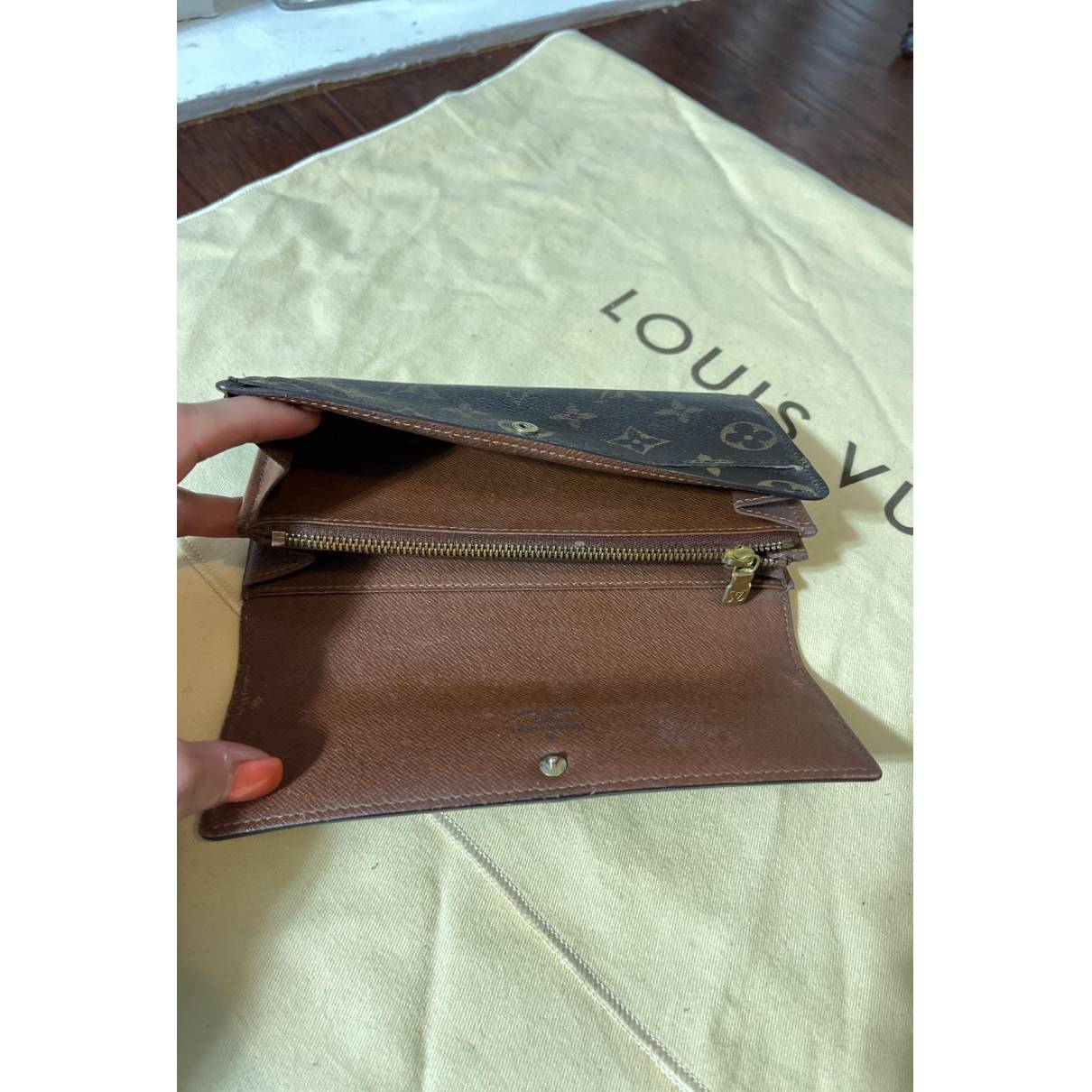 Leather wallet Louis Vuitton Brown in Leather - 24972794