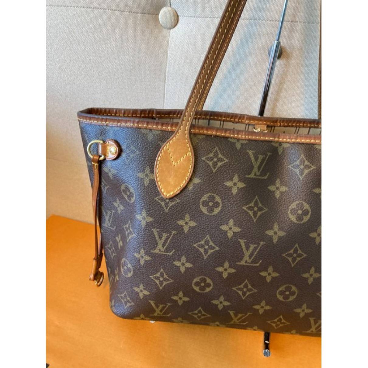Neverfull leather handbag Louis Vuitton Brown in Leather - 23413017