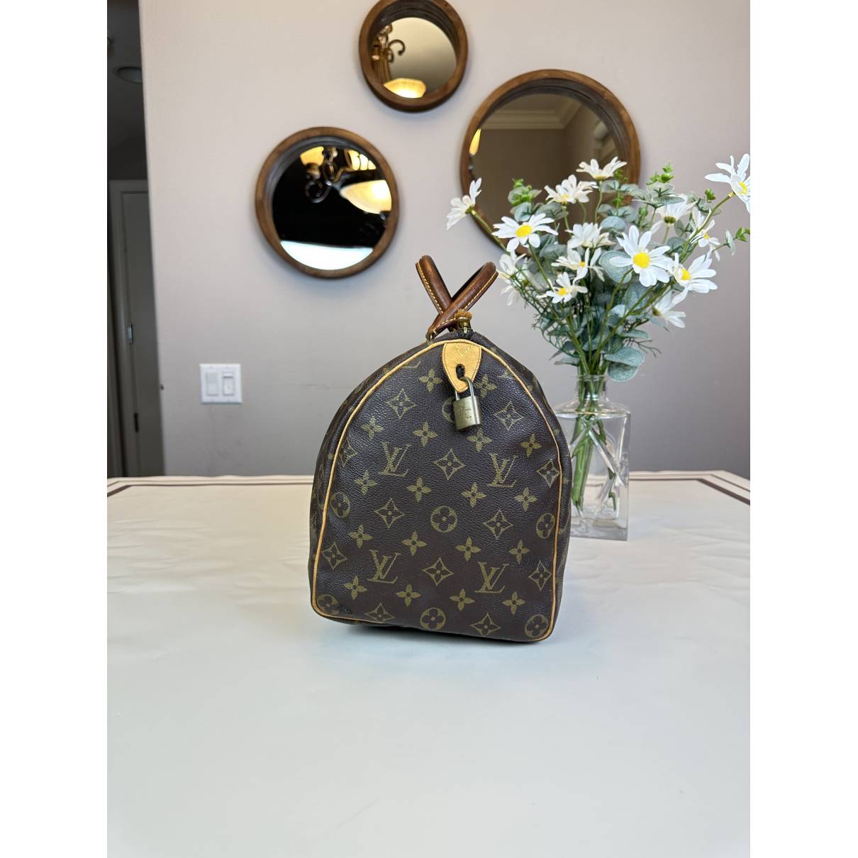 Speedy leather handbag Louis Vuitton Brown in Leather - 31203485