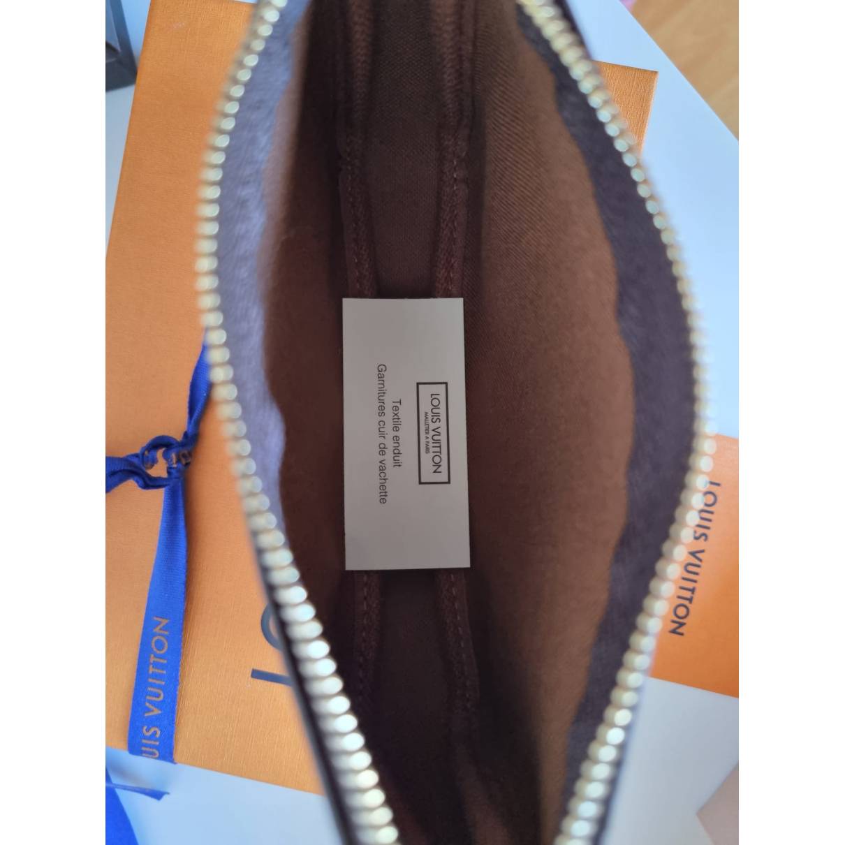 Pochette accessoire cloth handbag Louis Vuitton Brown in Cloth - 18330136