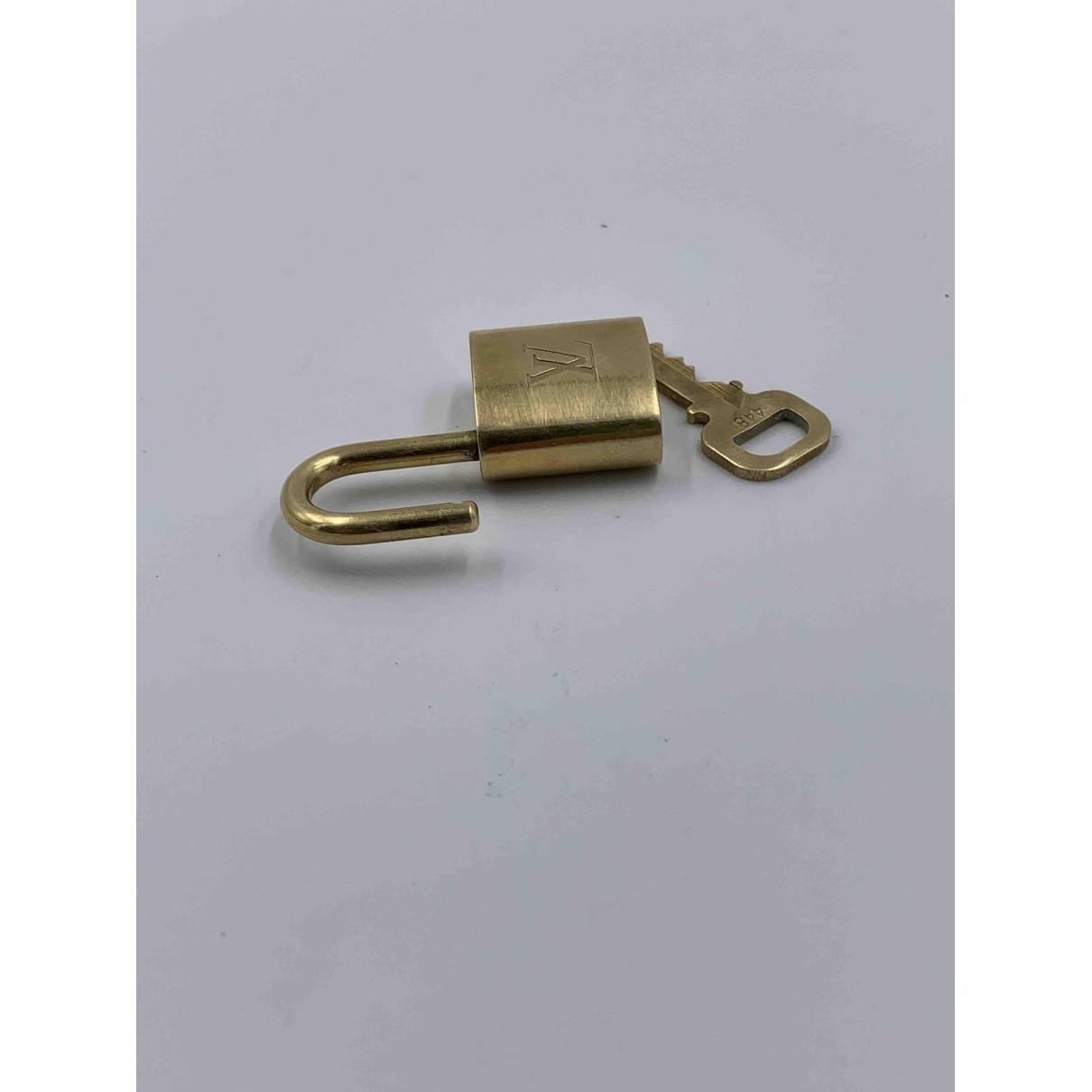 Lockit gold bag charm Louis Vuitton Gold in Gold - 16048511