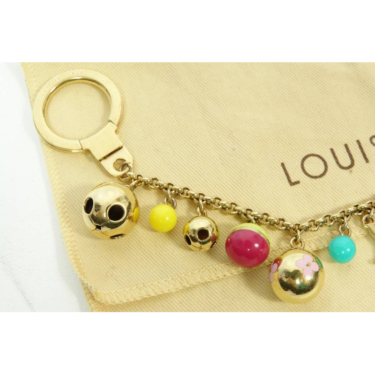 Leather bag charm Louis Vuitton Gold in Leather - 24969877