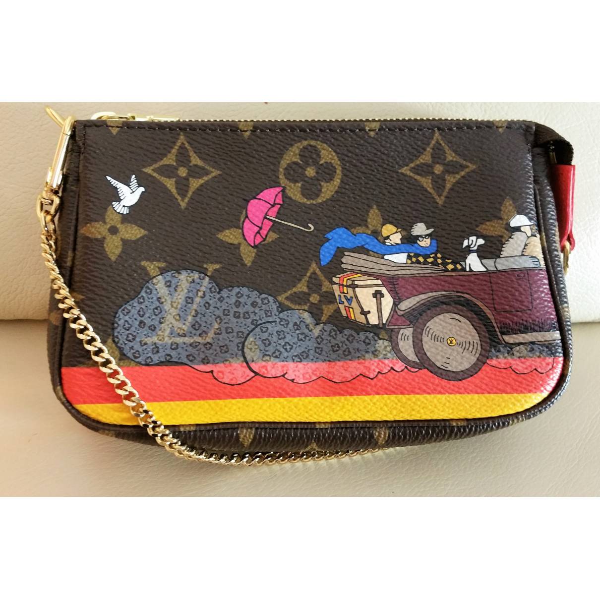Pochette accessoire cloth handbag Louis Vuitton Multicolour in Cloth -  25741029