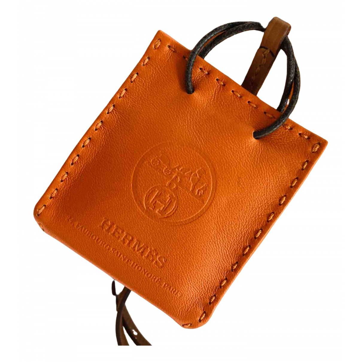 Shopping bag charm leather bag charm Hermès Orange in Leather