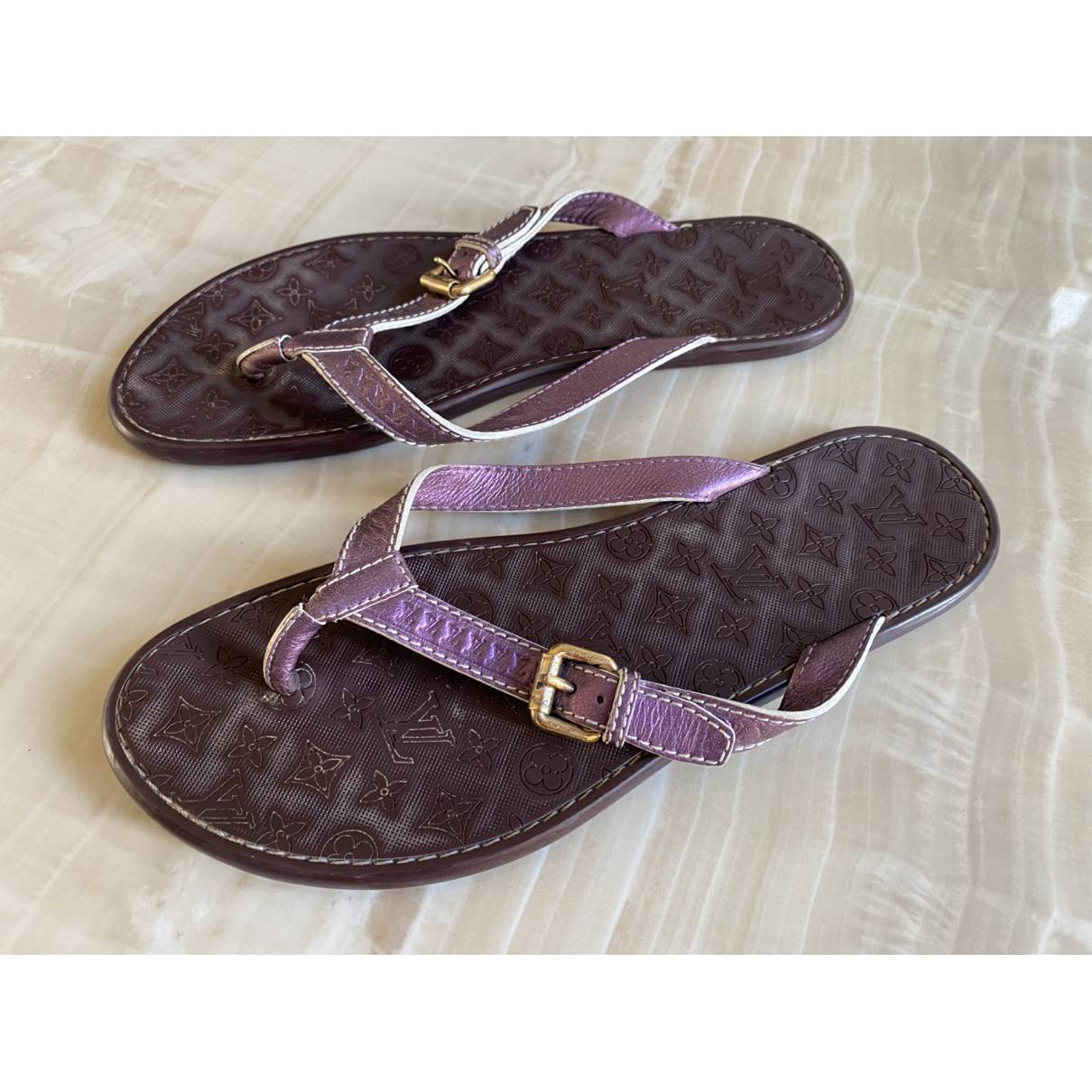 Leather flip flops Louis Vuitton Purple size 40 EU in Leather