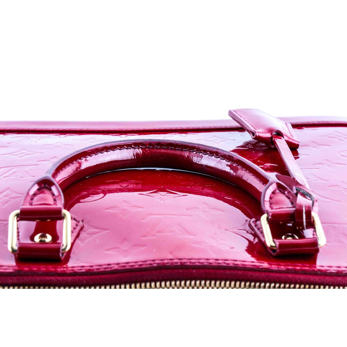 Louis Vuitton Alma handbag in red patent leather, mono…
