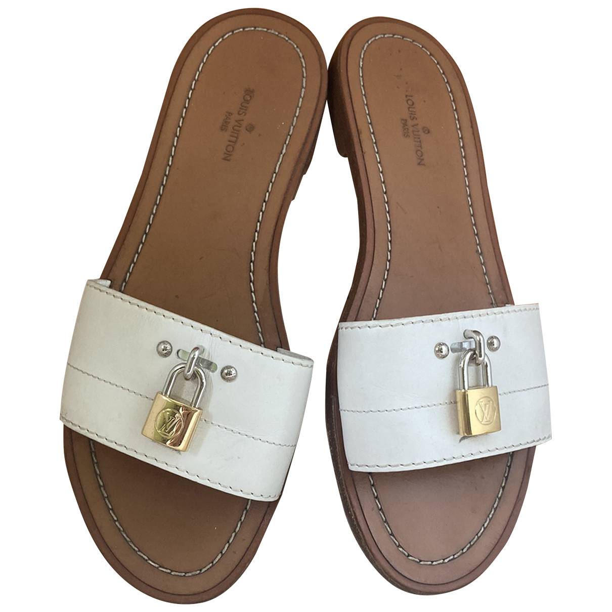 Lock it leather mules Louis Vuitton White size 35 EU in Leather - 31873752