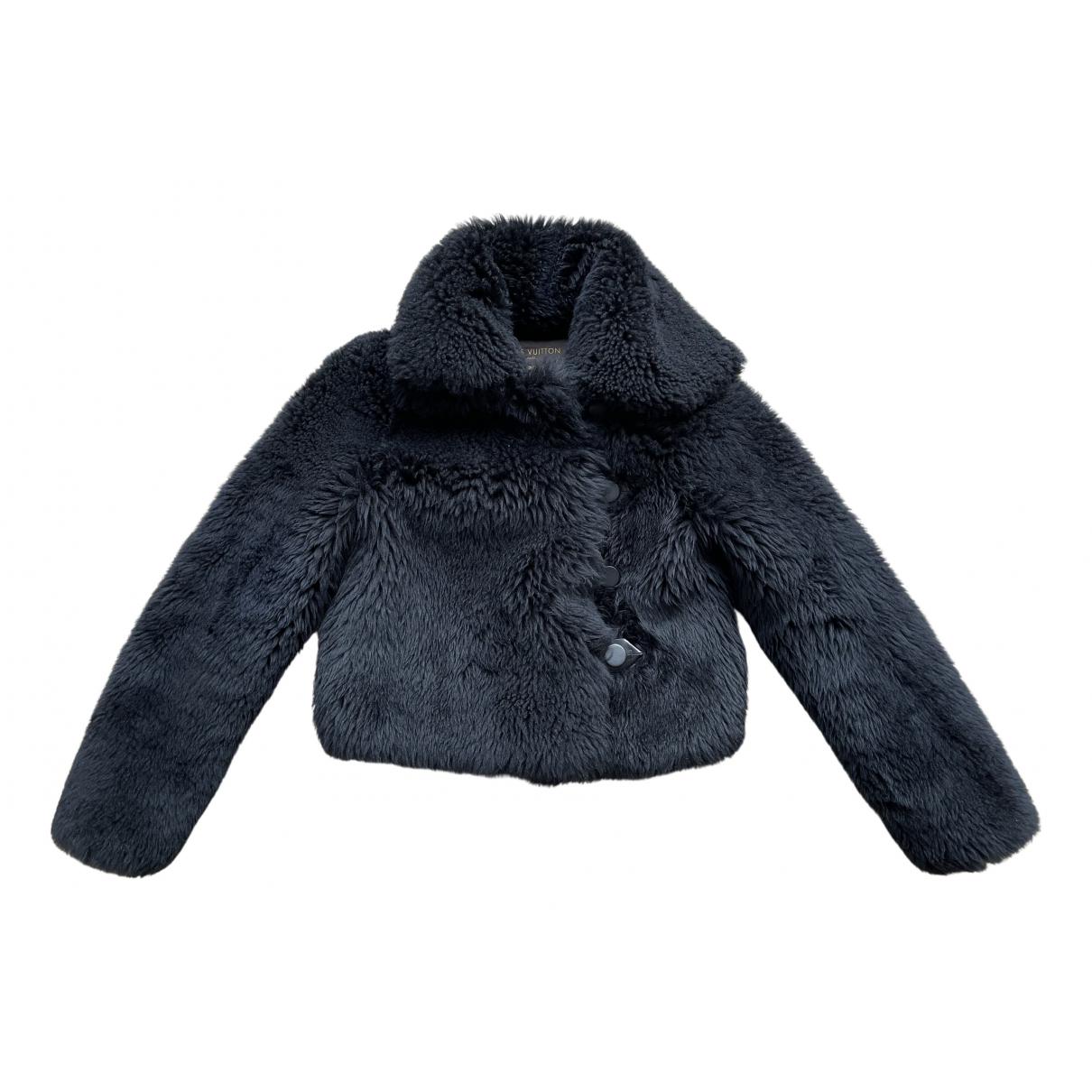 Shearling coat Louis Vuitton Black size 48 FR in Shearling - 13138358