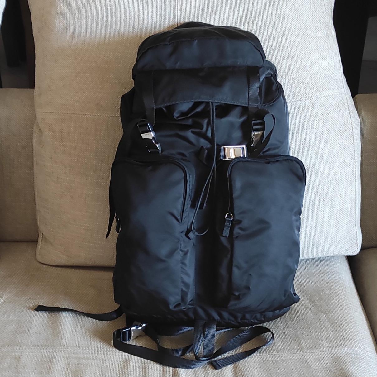 Travel bag Prada Black in Synthetic - 20569774