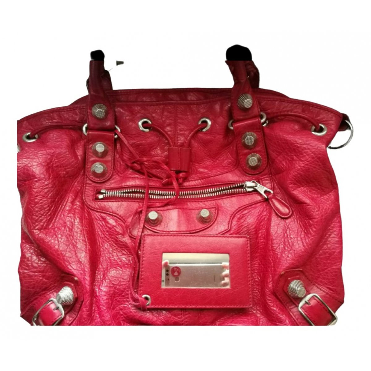 Pompon leather handbag