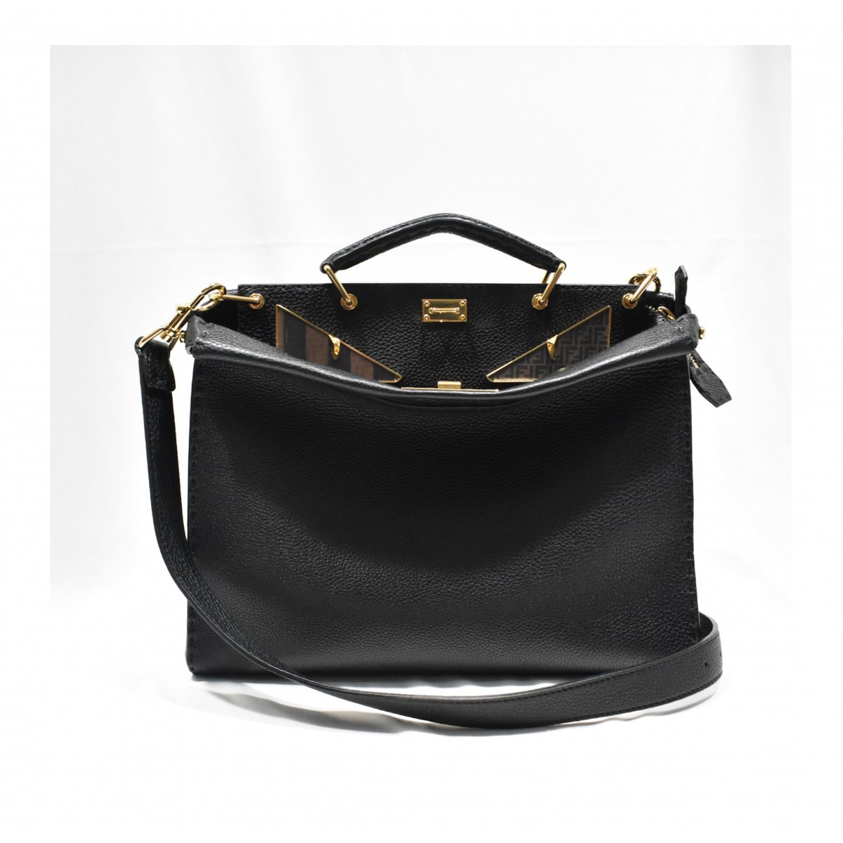 Peekaboo leather travel bag