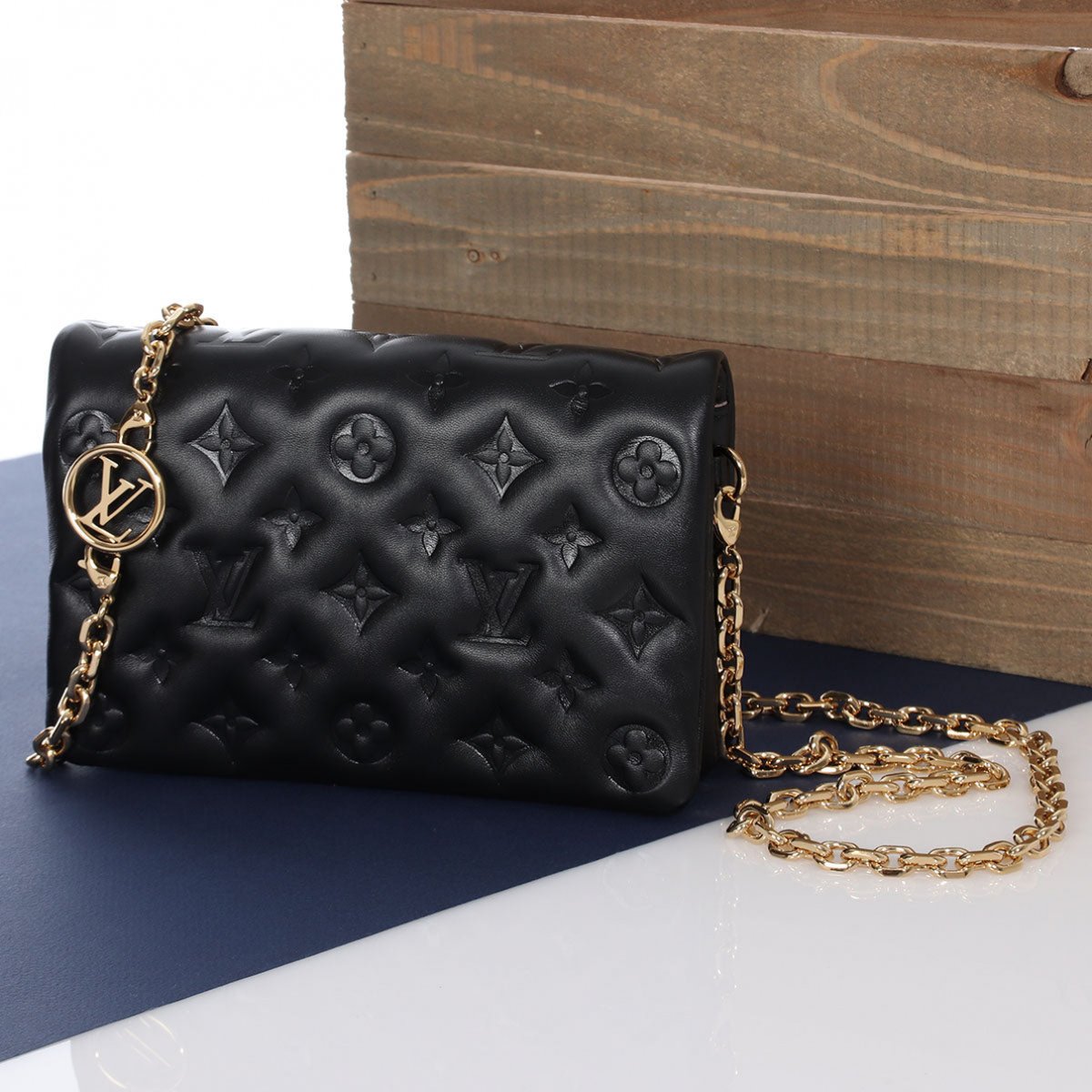 Coussin leather crossbody bag