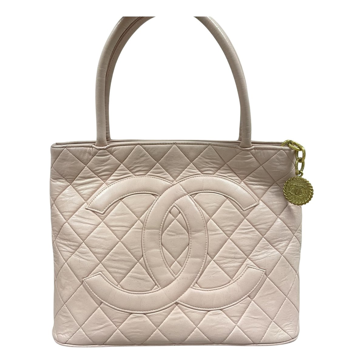 Médaillon leather handbag