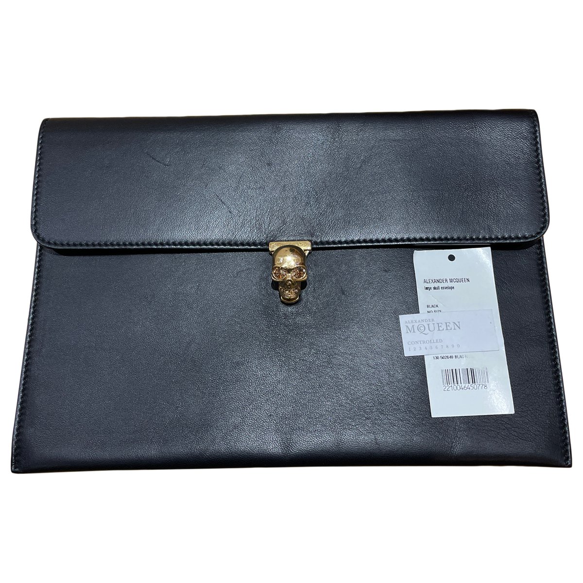 Skull leather clutch bag