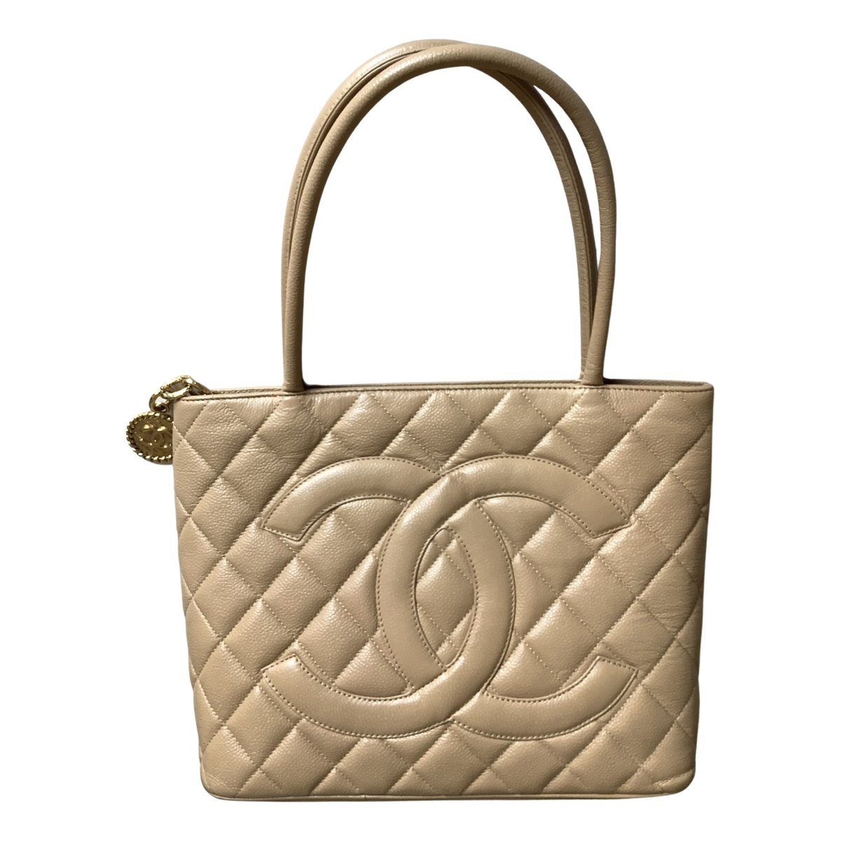 Médaillon leather handbag