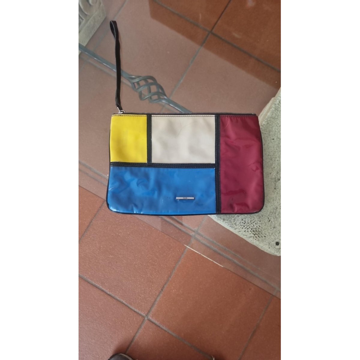 Patent leather clutch bag