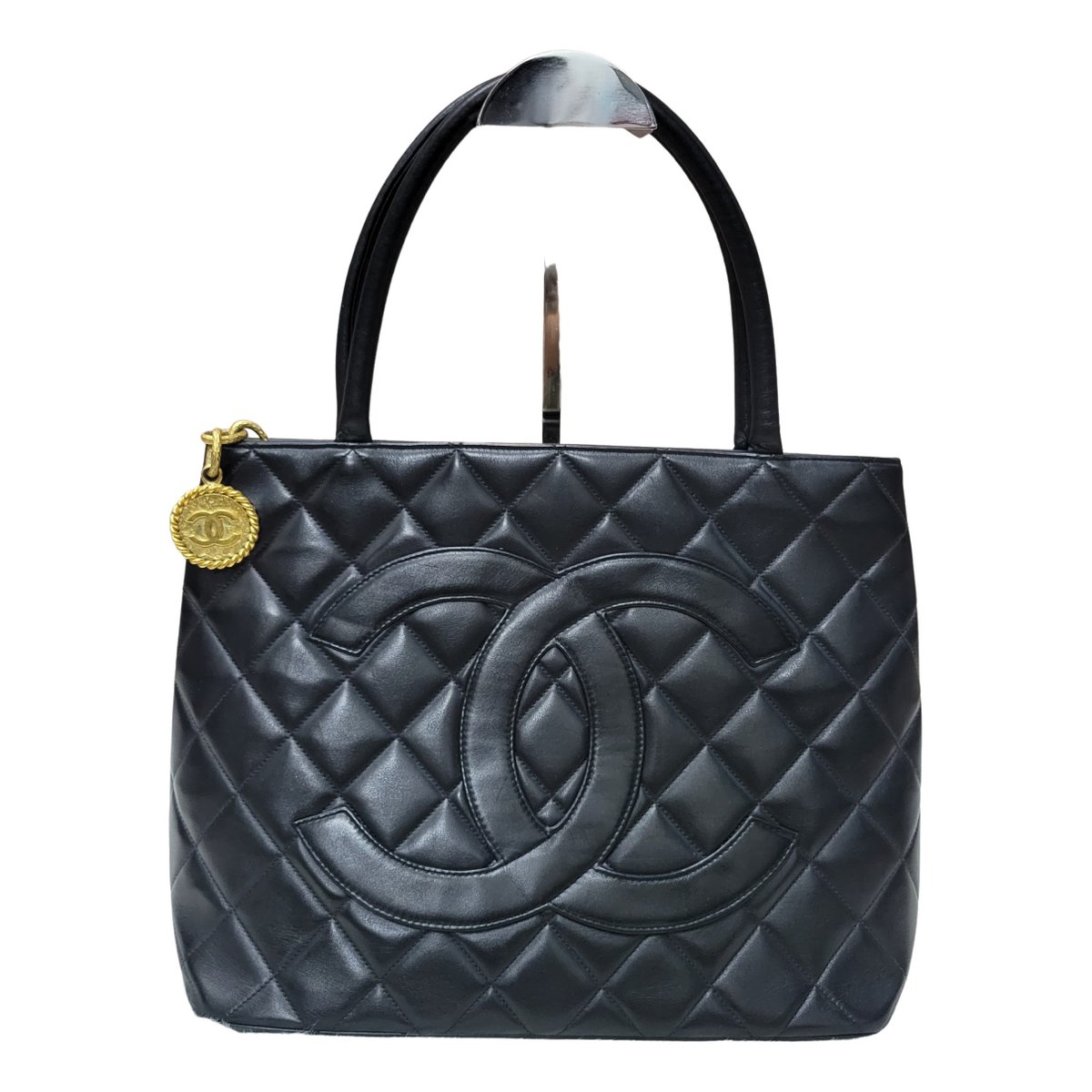 Médaillon leather handbag
