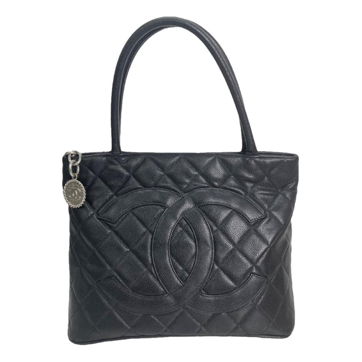 Médaillon leather handbag