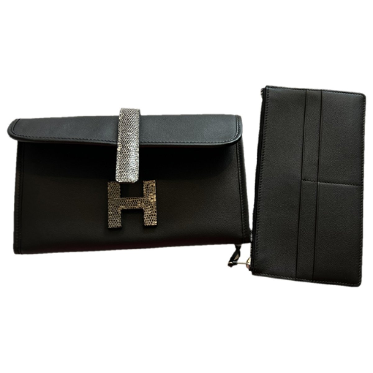 Jige patent leather clutch bag