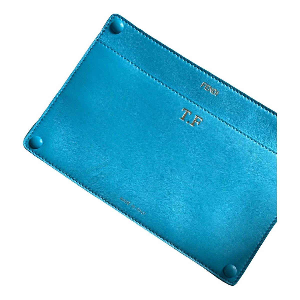 Peekaboo patent leather clutch bag