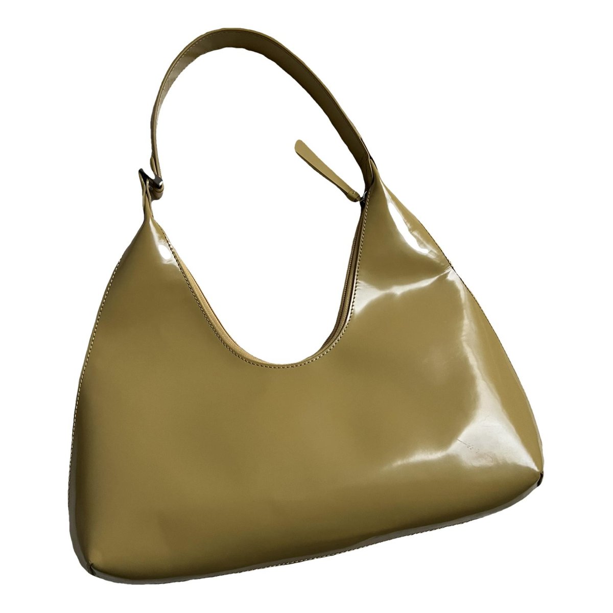 Amber patent leather handbag