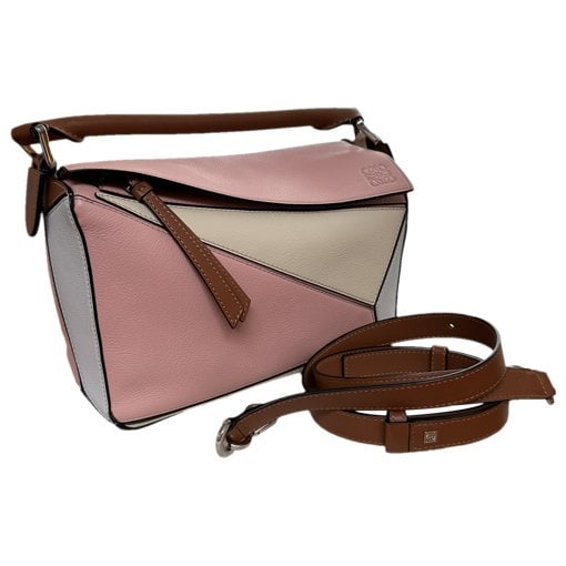Puzzle leather handbag