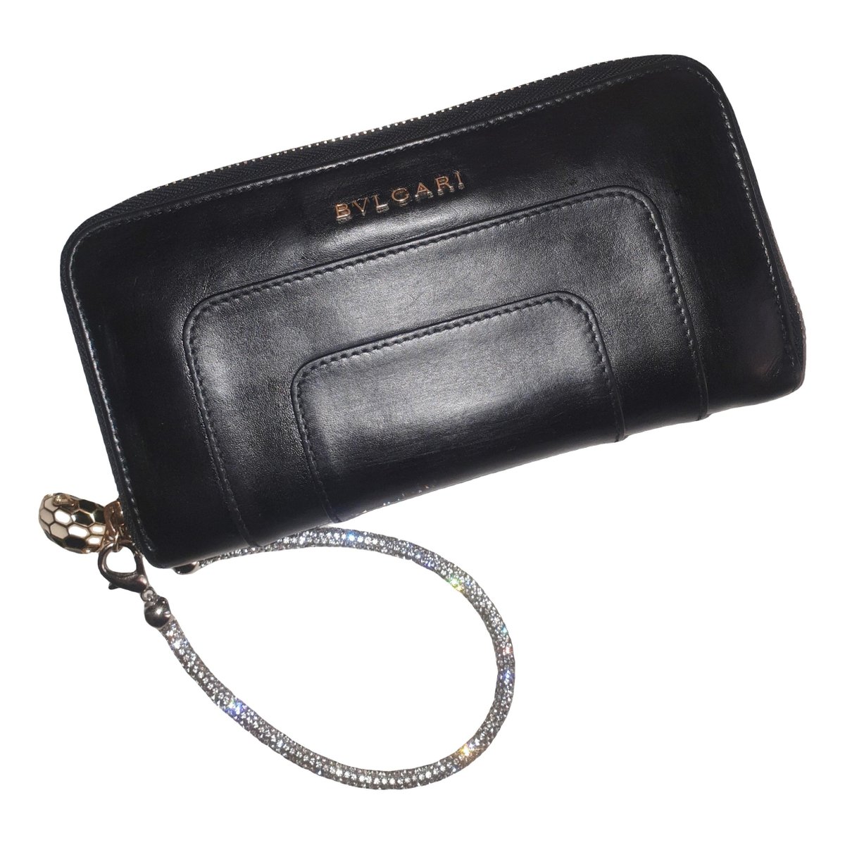 Serpenti leather clutch bag