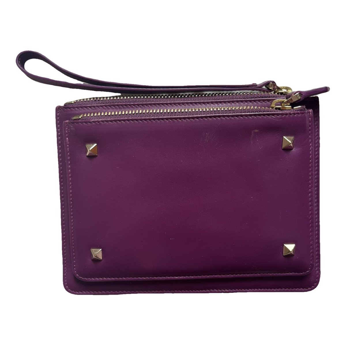 Rockstud leather clutch bag