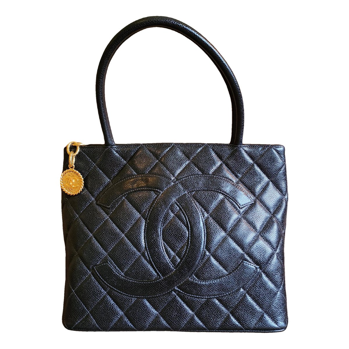 Médaillon leather handbag