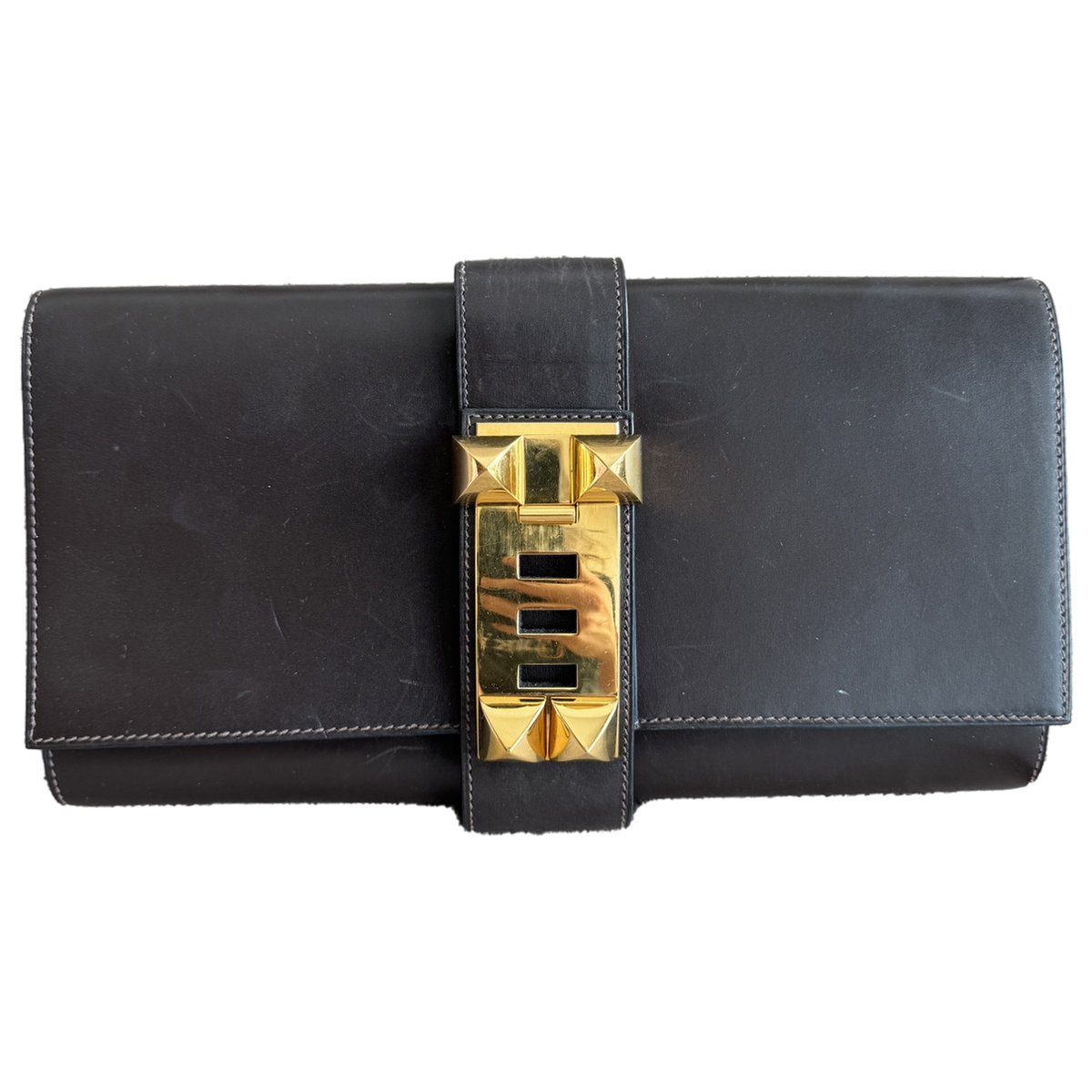 Médor leather clutch bag