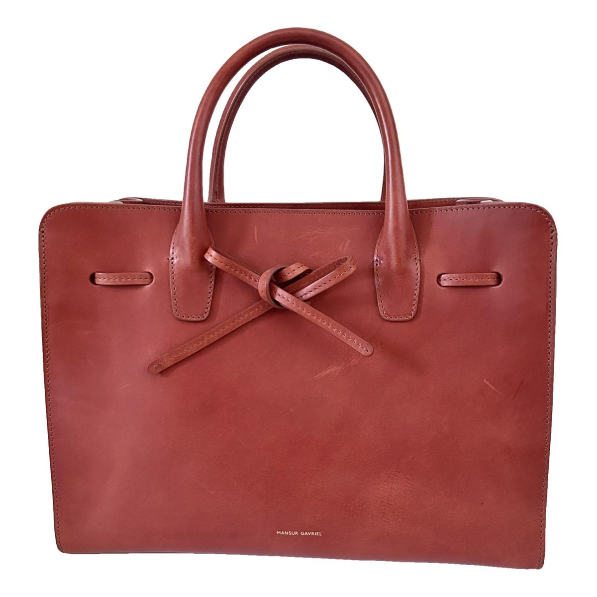 Folded leather handbag