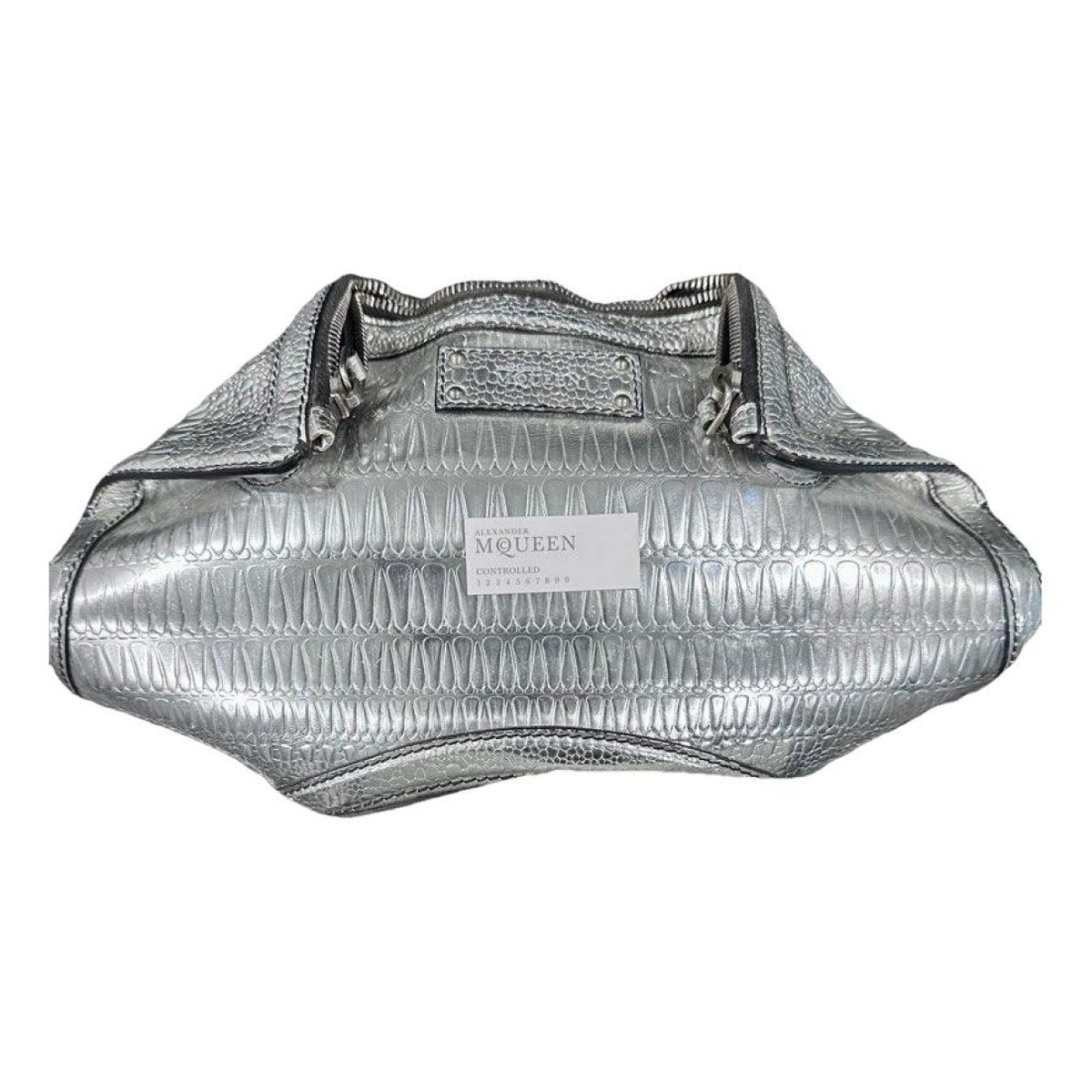 Manta leather clutch bag