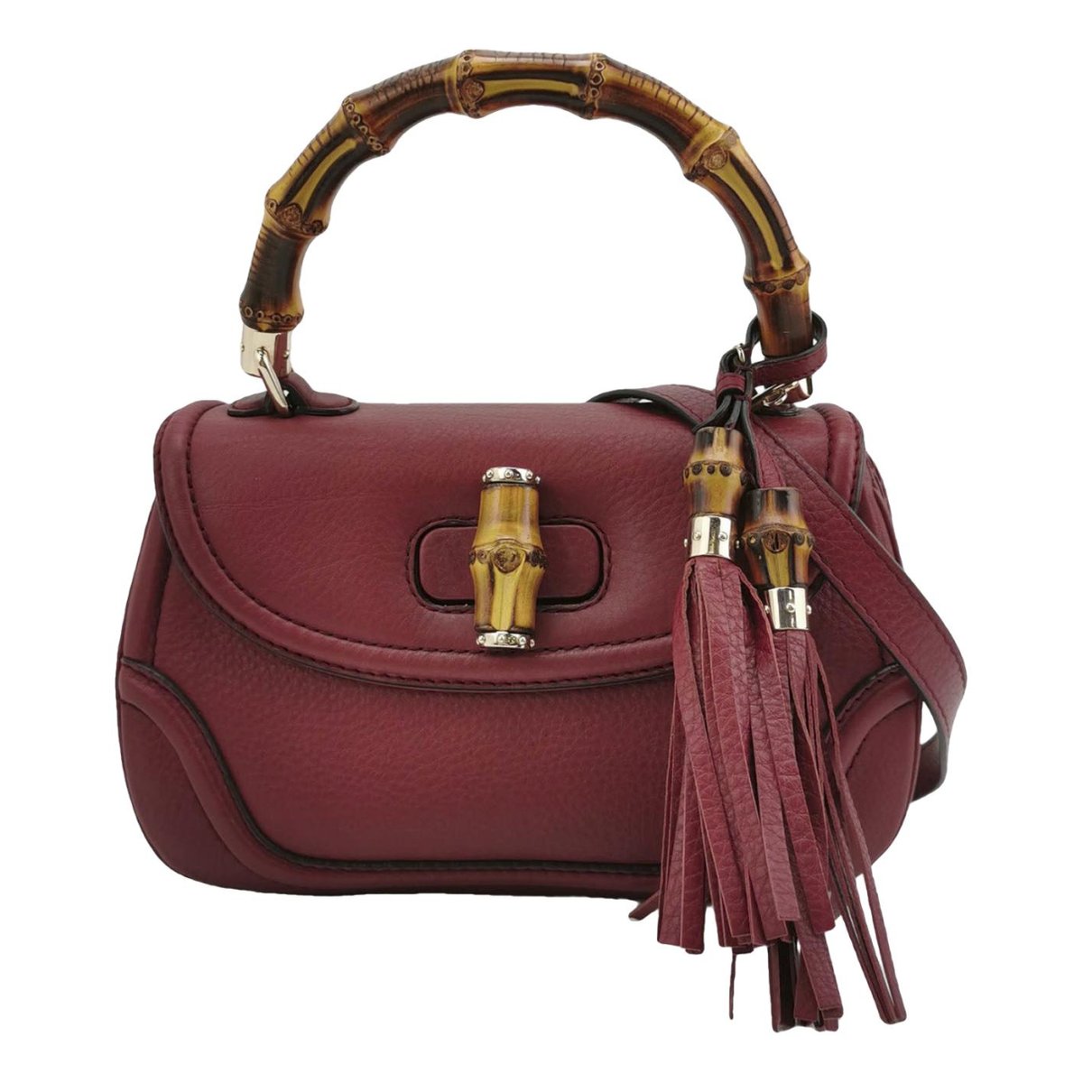 Convertible Pompon Bamboo Top Handle leather handbag