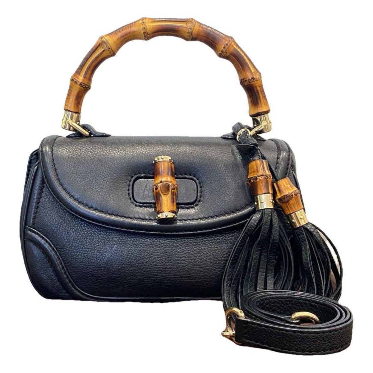 Convertible Pompon Bamboo Top Handle leather handbag
