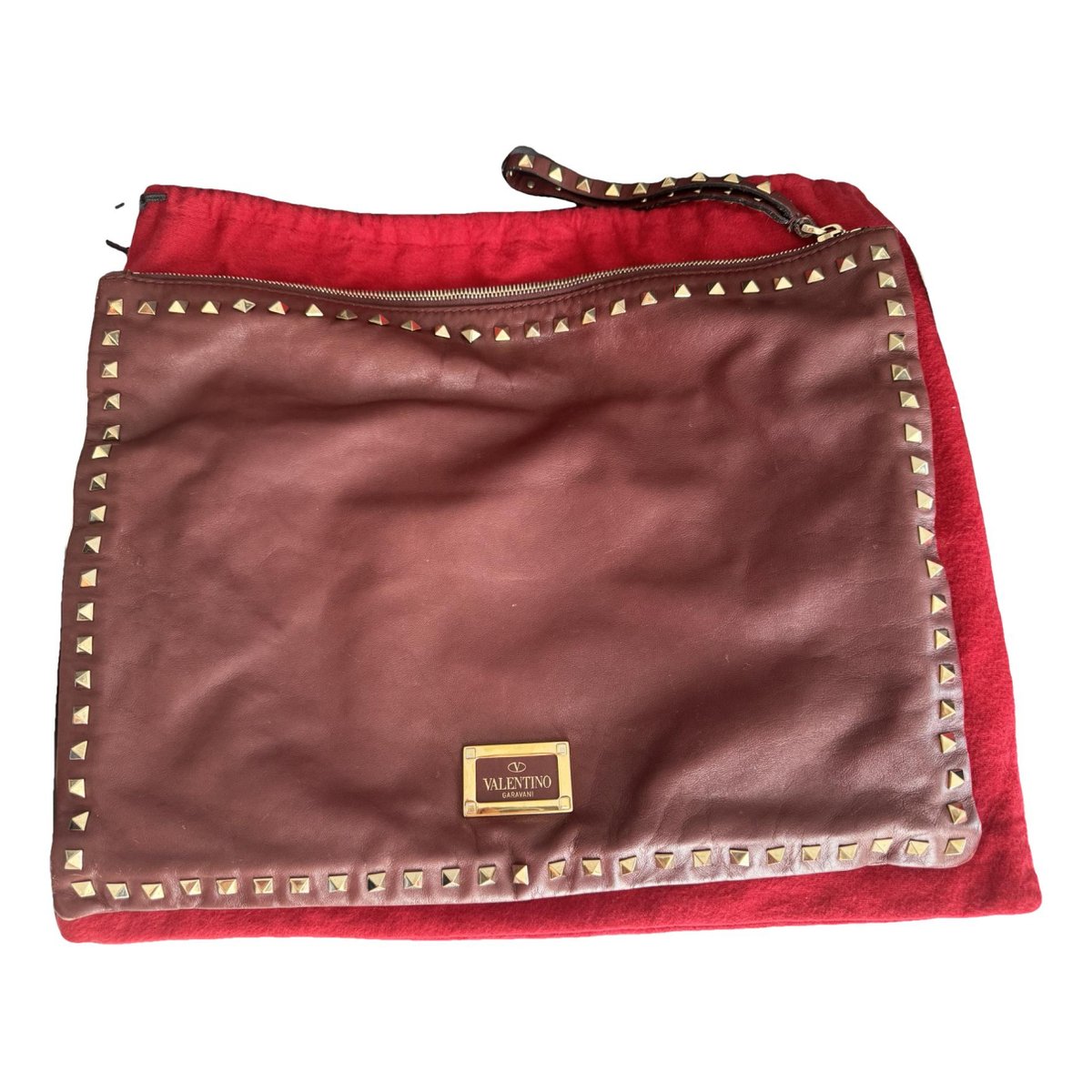 Rockstud leather clutch bag