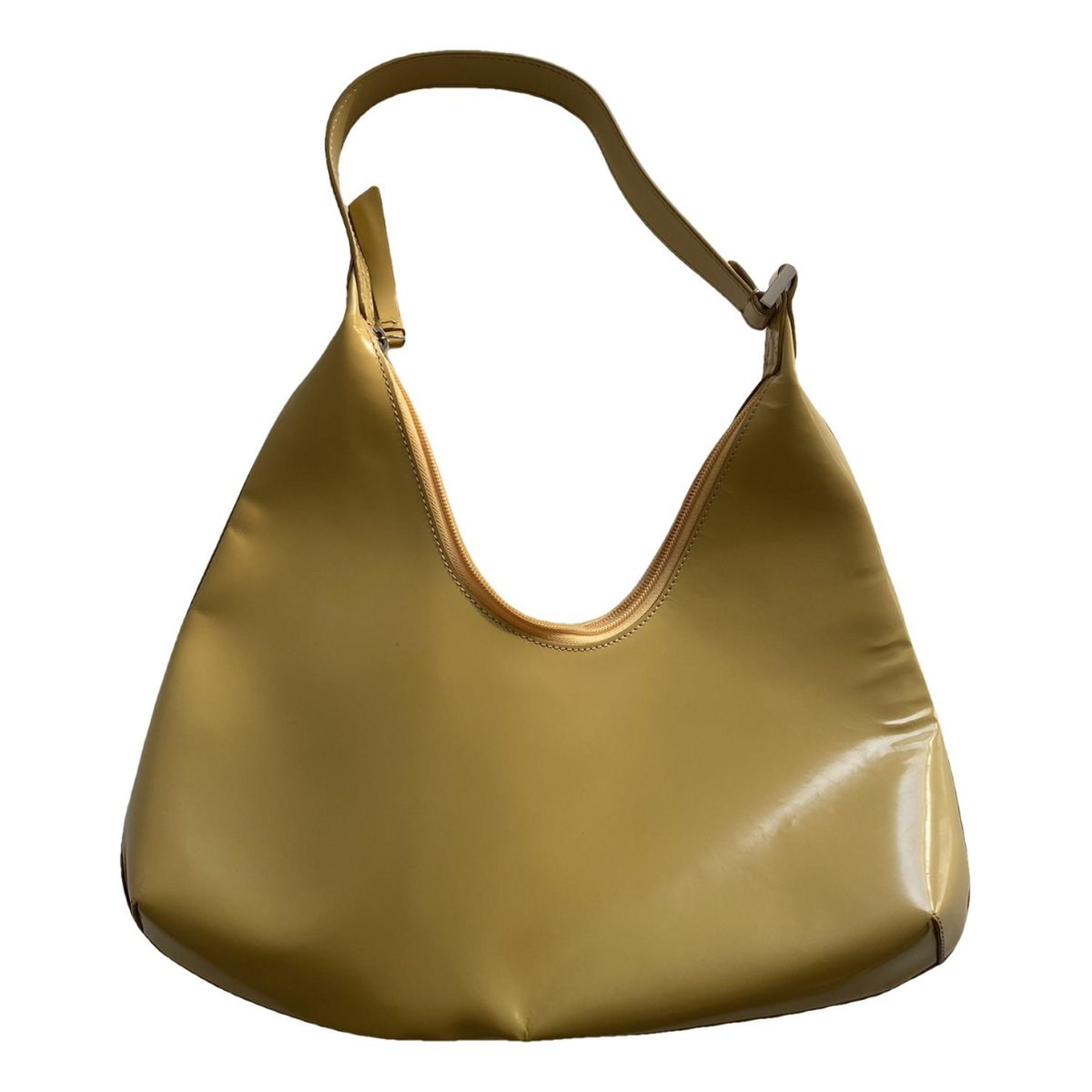 Amber patent leather handbag