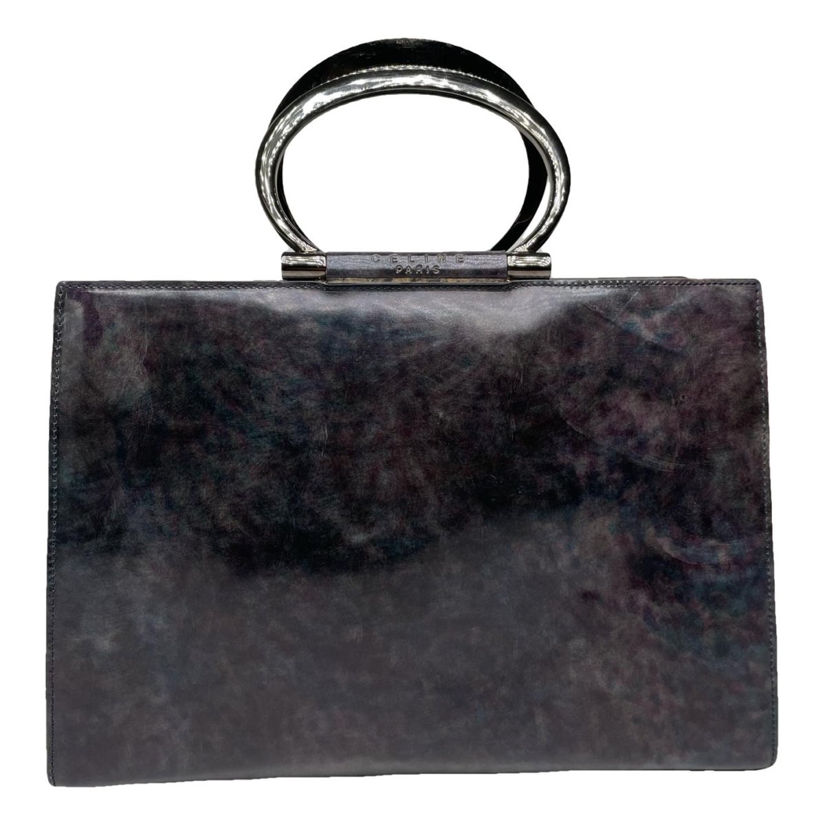 Ring patent leather handbag
