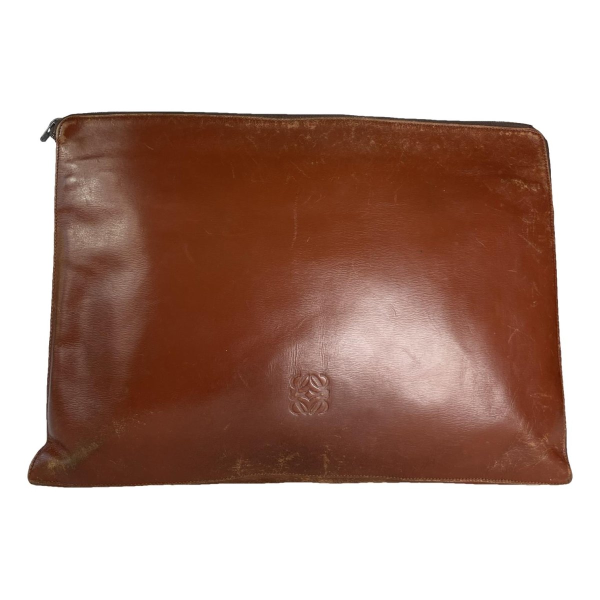 Puzzle leather clutch bag