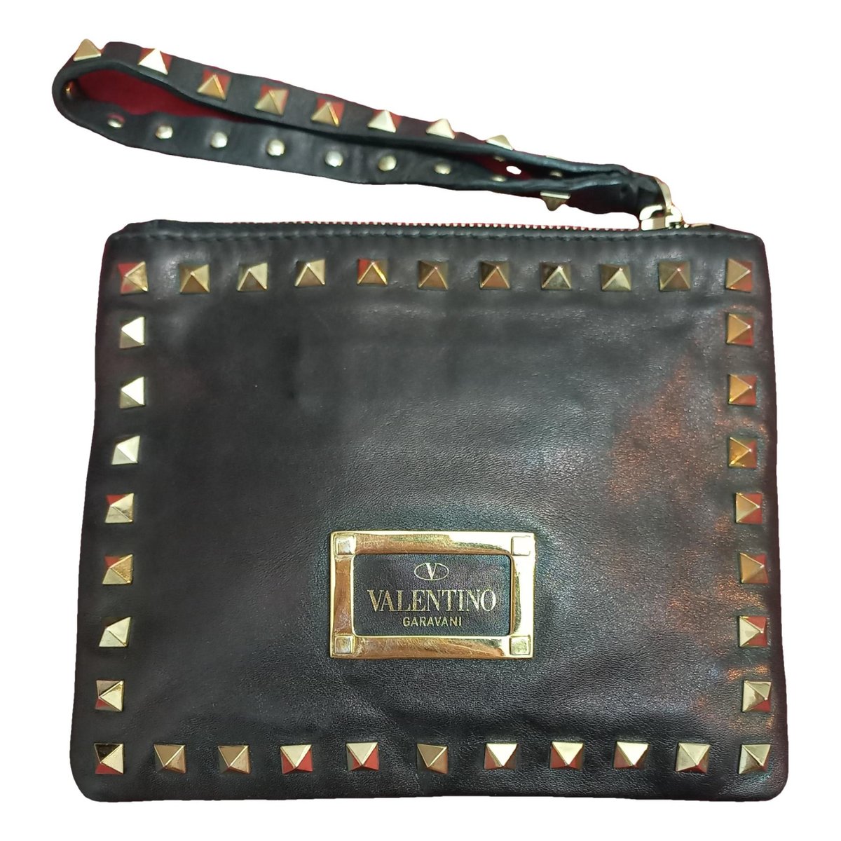 Rockstud leather clutch bag