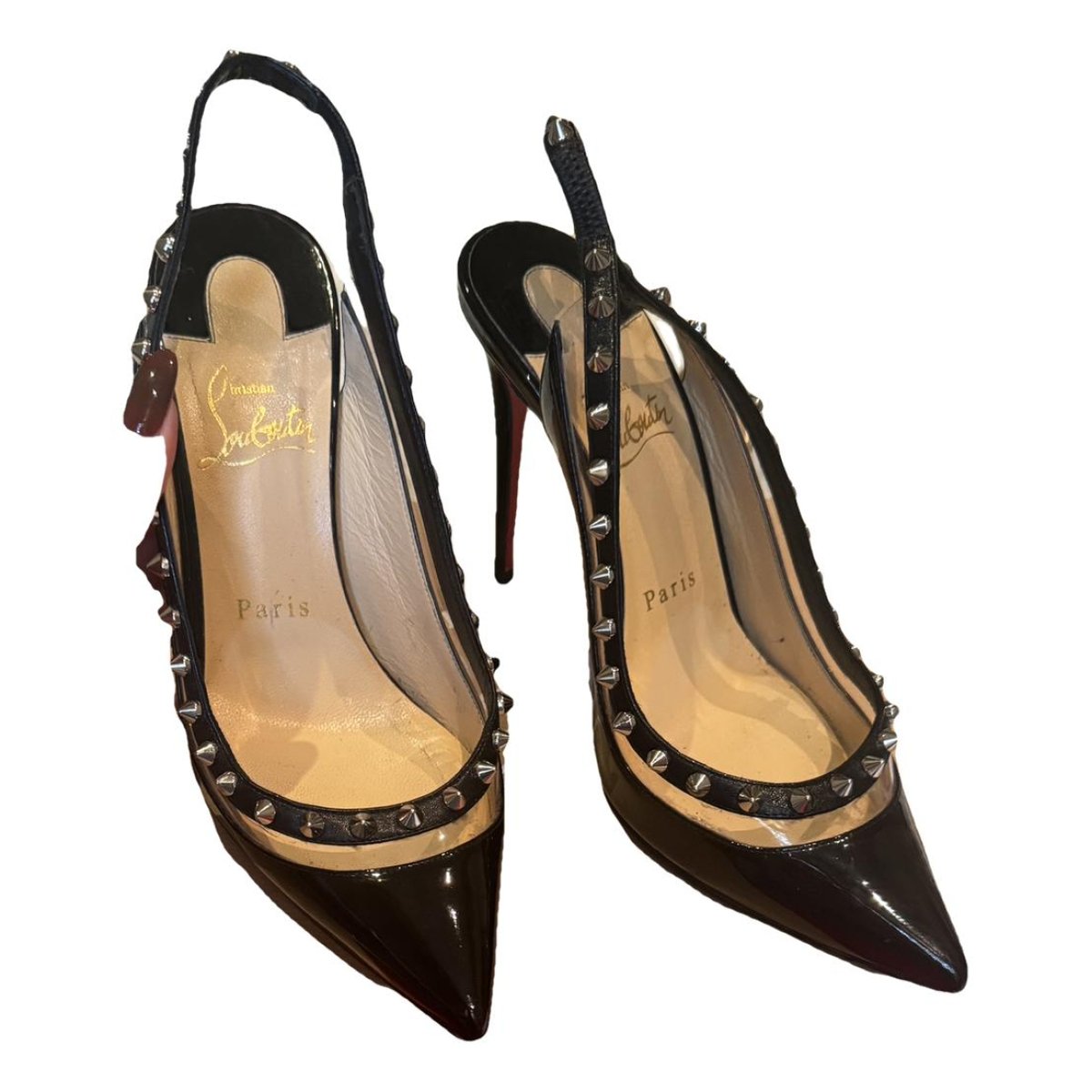 Nosy Spikes patent leather heels