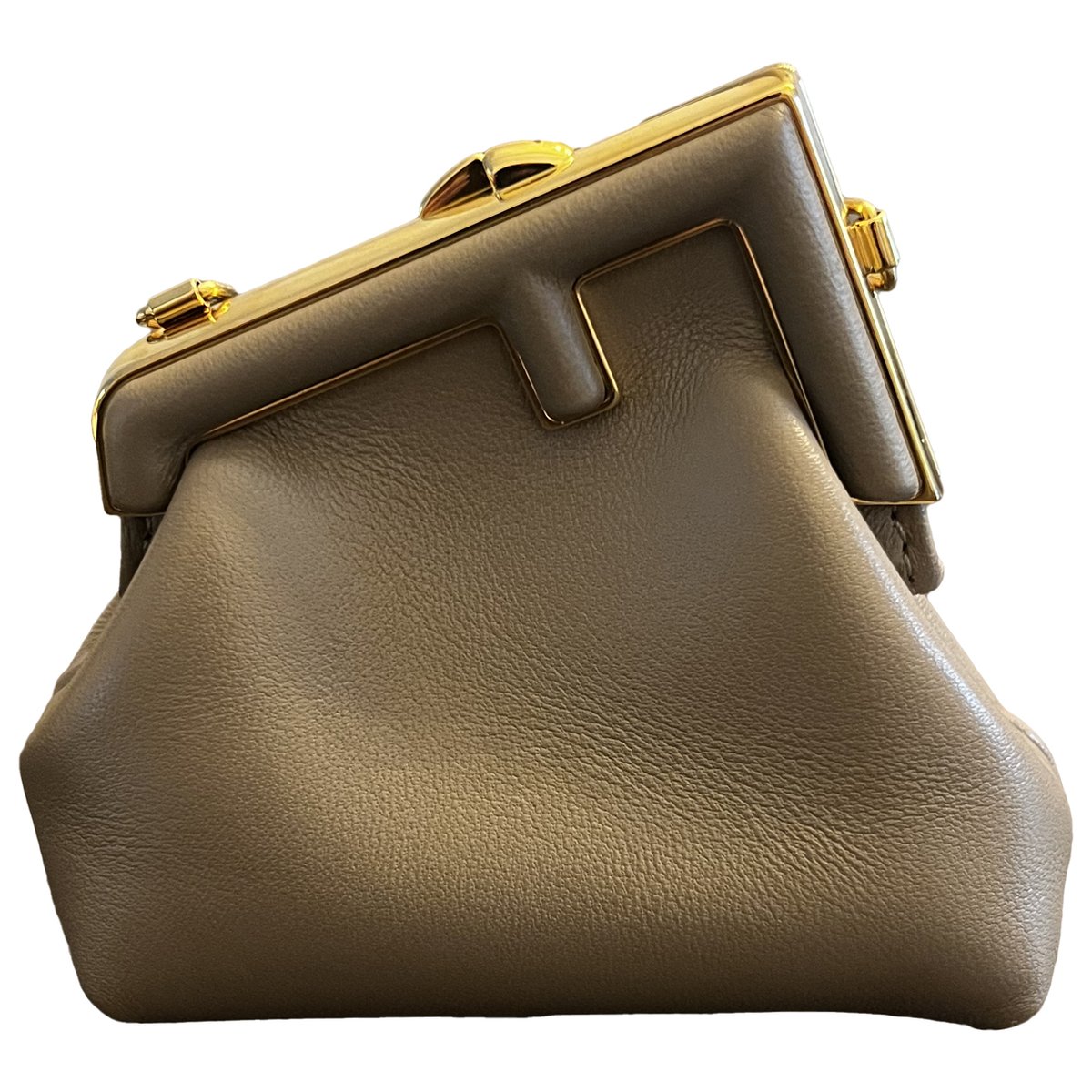 First leather handbag