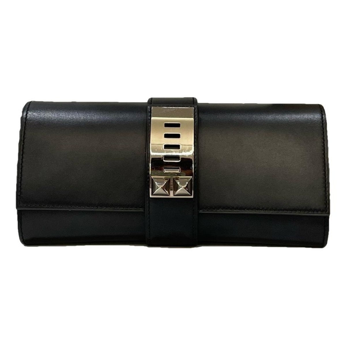 Médor leather clutch bag